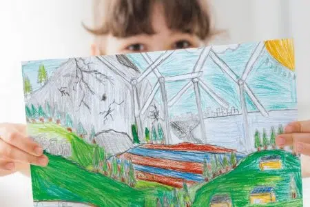 Estra: approvato il Bilancio di Sostenibilità 2022 del Gruppo Estra presentazione bilancio sostenibilità 2022, bambino con disegno