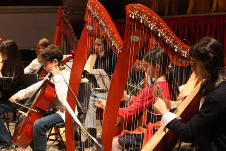 Montepulciano, “I suoni della danza” al concerto di Santa Cecilia Istituto di Musica Henze di Montepulciano, orchestra con arpe in primo piano